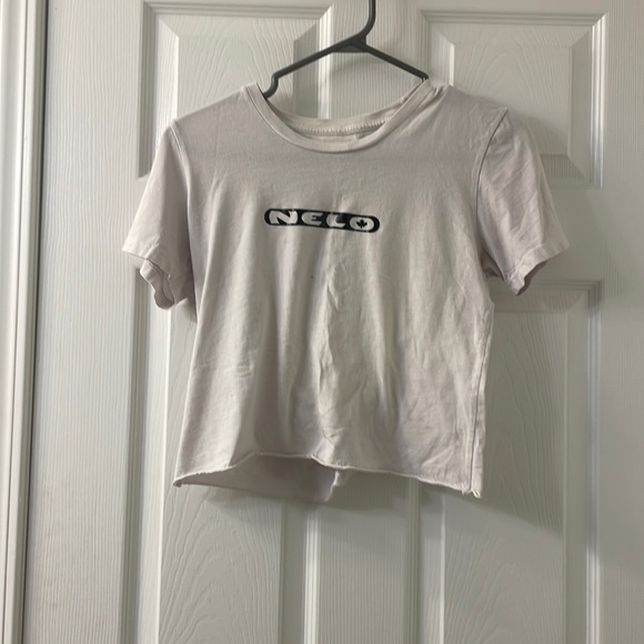 White shirt reads “neco” on the front with a design in the back - Picture 1 of 2